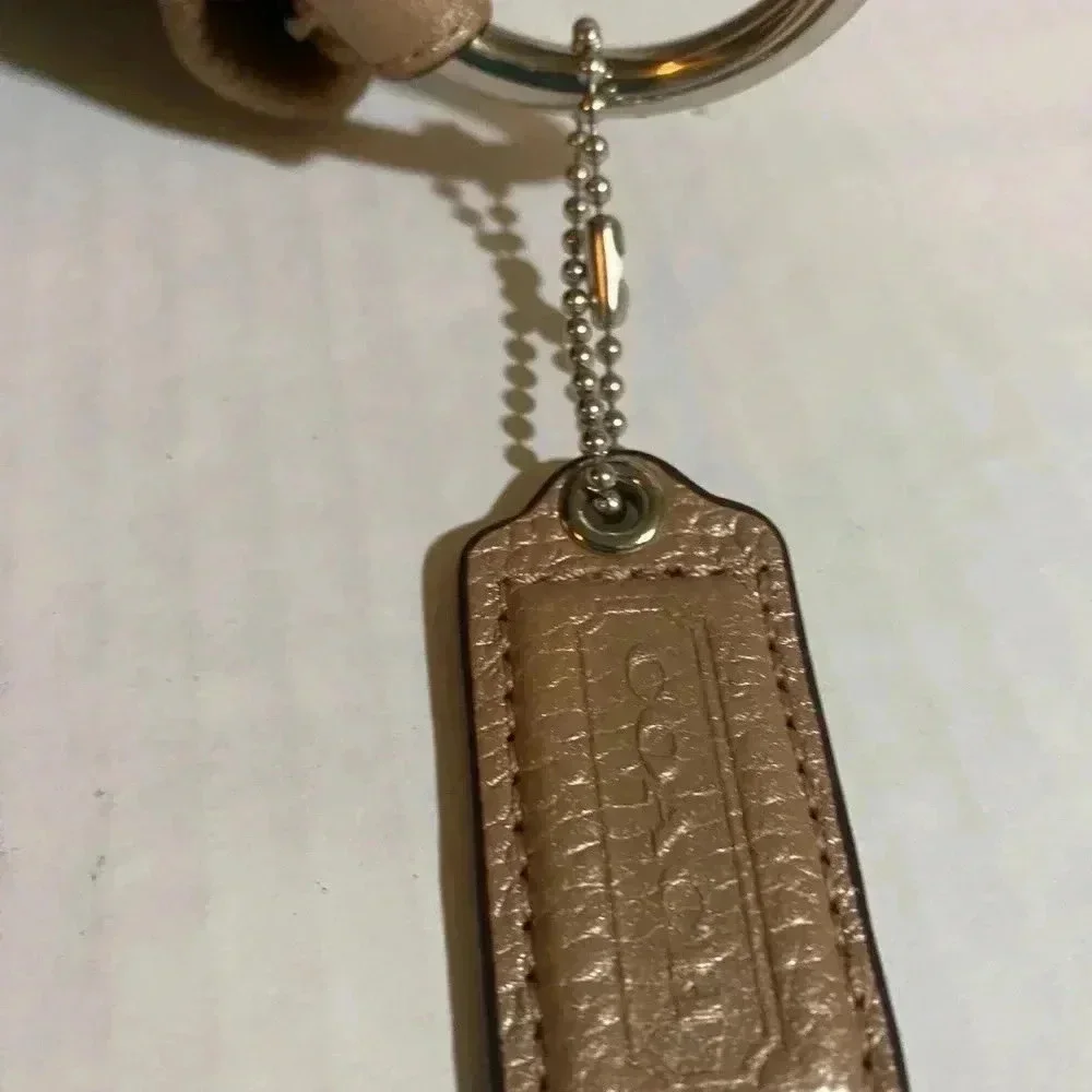 Coach metallic pink